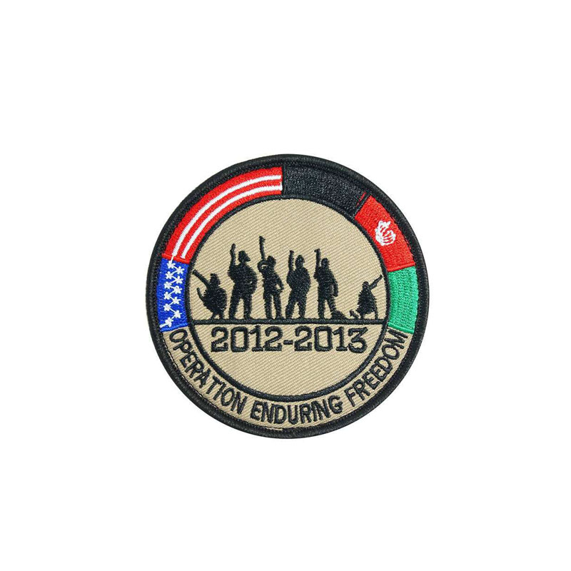 Kl&aelig;r Emblemer Fargerik broderilapp for bluse